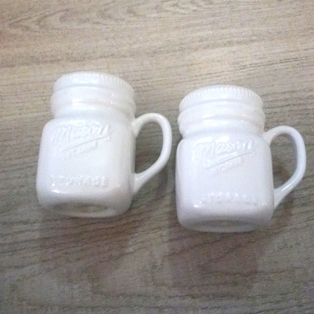 Set of Mason jar salt and pepper shakers.